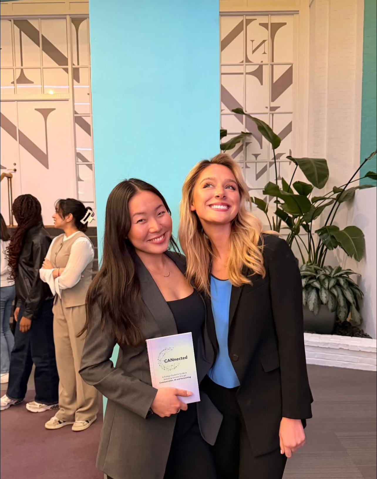 Joie and Kaitlyn at a Northeastern networking event